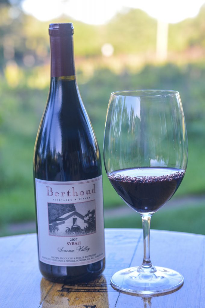 Berthoud Syrah bottle and glass of wine